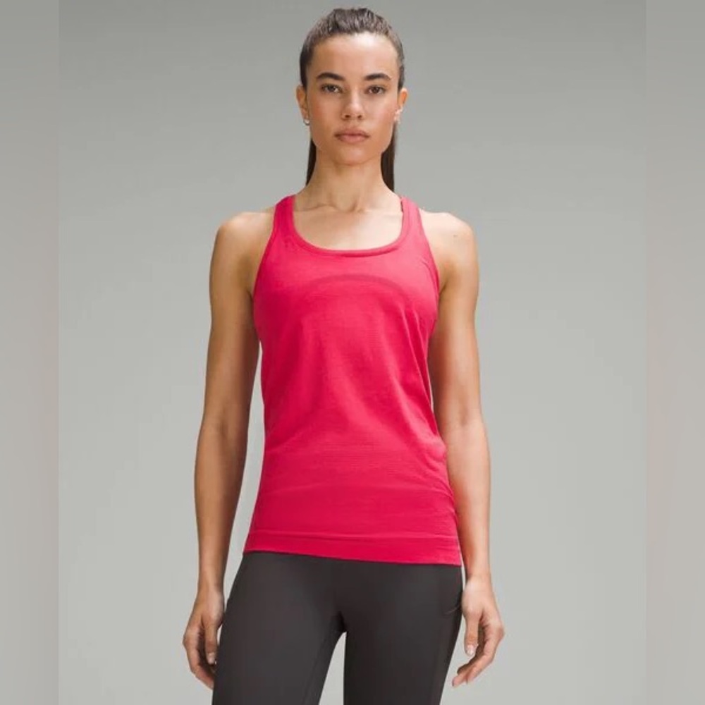 Lululemon Pink Razorback Tank Top Size 4. Pink tiger print.